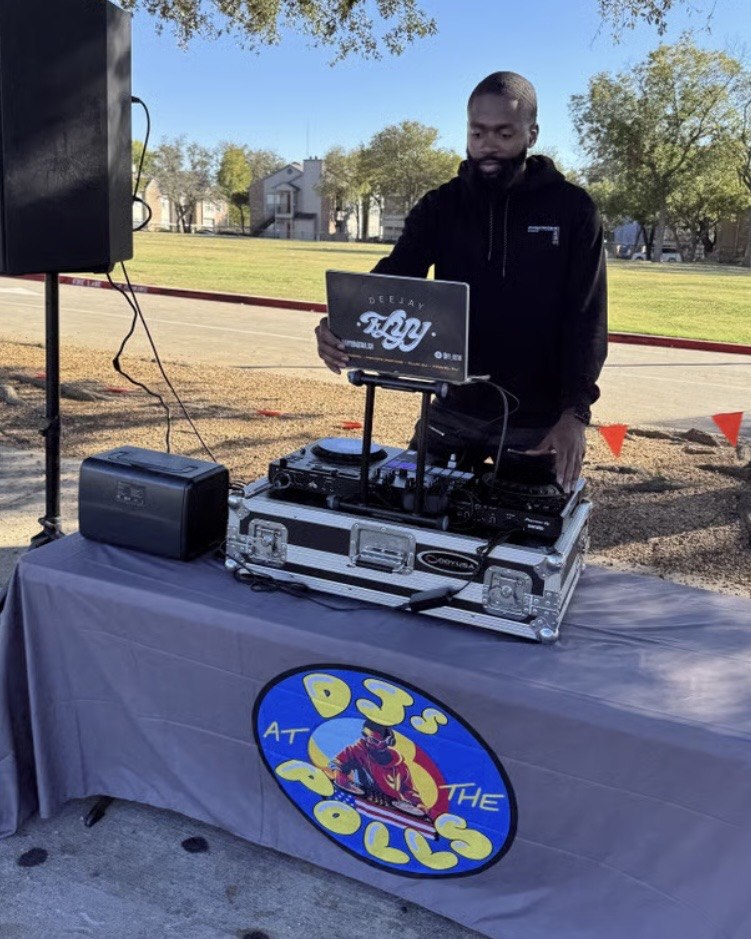 DJ FLYY performing at a community DJs at the Polls civic event